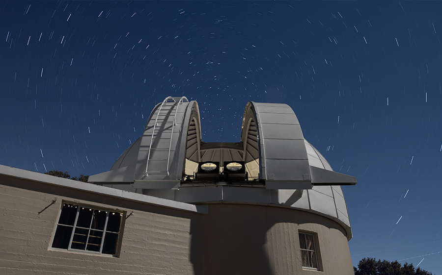 Two PANOSETI telescopes installed in the recently renovated Astrograph Dome at Lick Observatory. PANOSETI will utilize a configuration of many SETI telescopes to allow simultaneous monitoring of the entire observable sky. Photo by © Laurie Hatch.